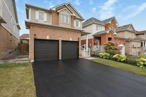 Front exterior and double garage